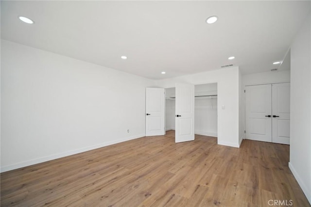 unfurnished bedroom featuring light hardwood / wood-style floors