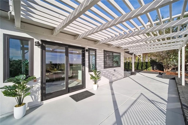 view of patio featuring a pergola