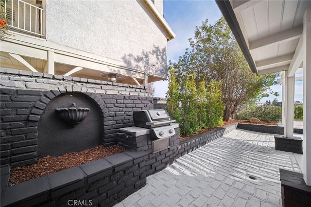 view of patio / terrace featuring a grill