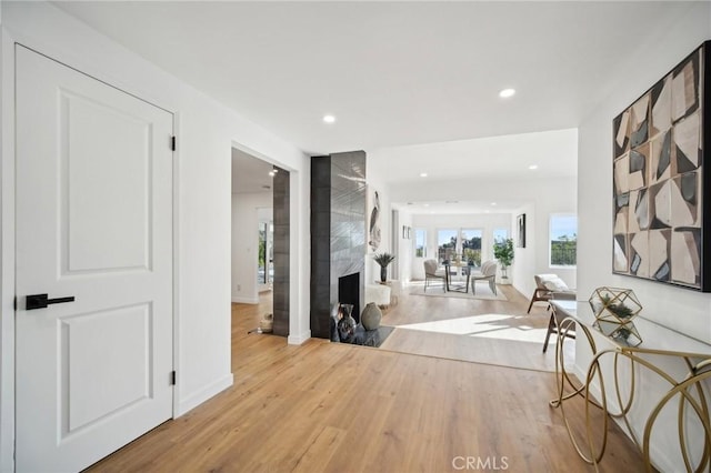 hall with light hardwood / wood-style flooring