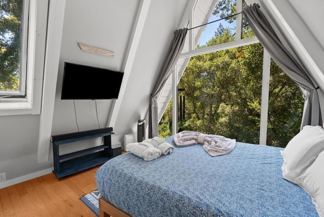 bedroom featuring hardwood / wood-style floors