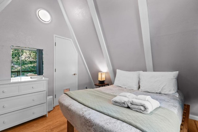 bedroom with light wood-type flooring