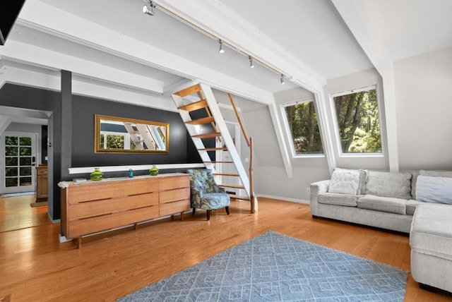 living area with hardwood / wood-style flooring