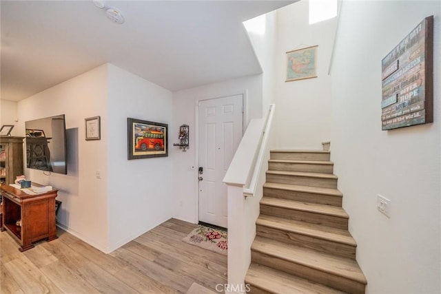 entrance foyer featuring light hardwood / wood-style floors