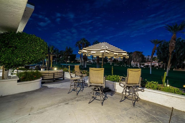 view of patio at night