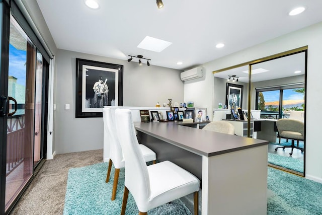 dining room with light colored carpet, a skylight, and an AC wall unit