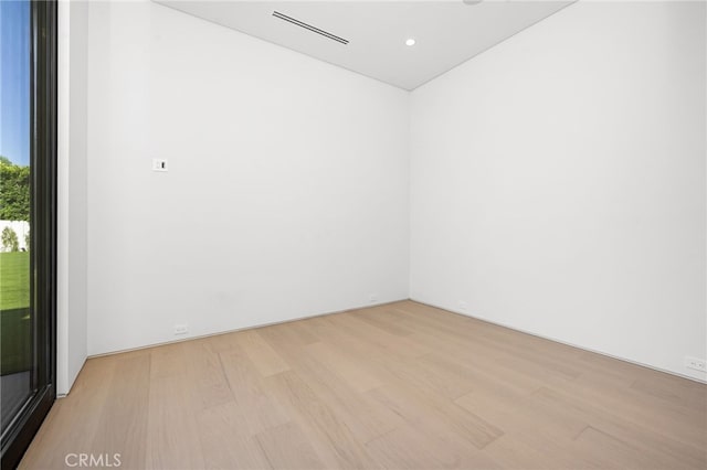 empty room with light wood-type flooring