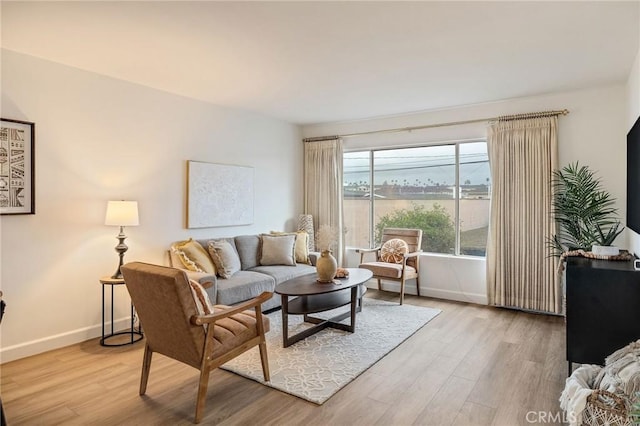 living room with light hardwood / wood-style floors