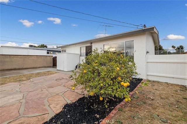 rear view of house with a patio area