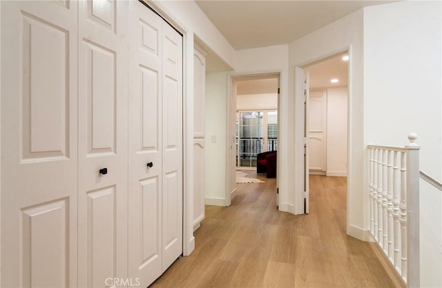 hallway featuring light wood-type flooring