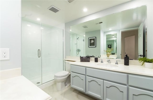 bathroom with vanity, an enclosed shower, and toilet