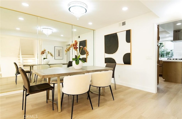 dining room with light hardwood / wood-style floors