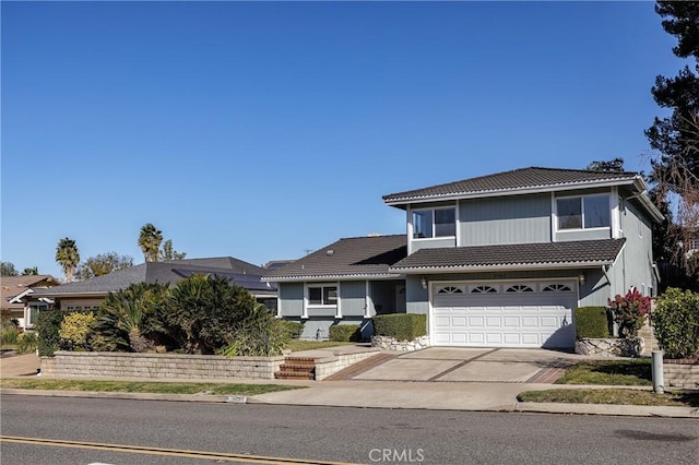 front of property featuring a garage