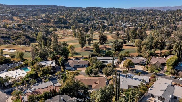 drone / aerial view featuring a mountain view