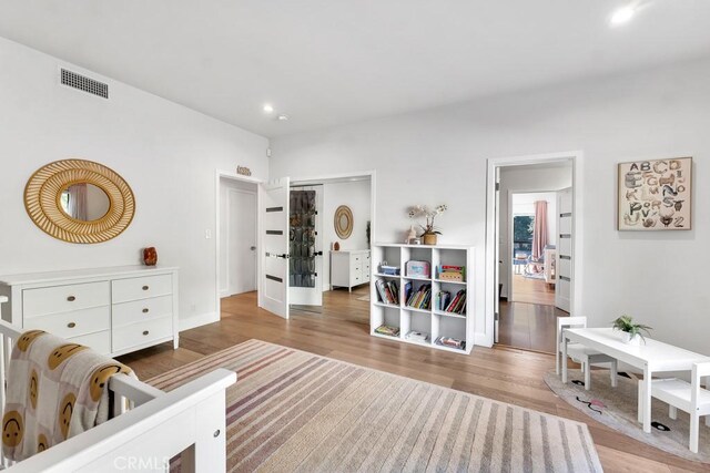 bedroom featuring light wood-type flooring