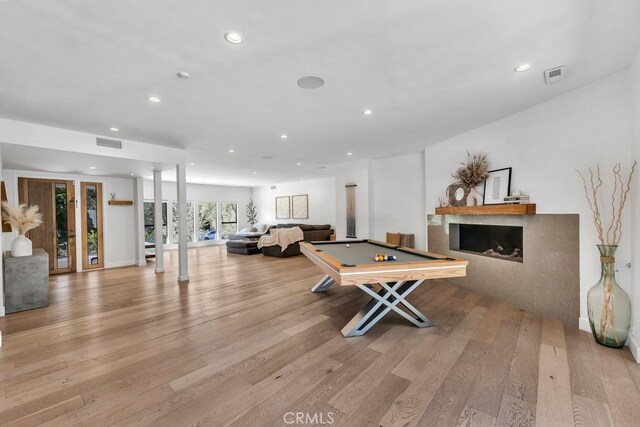 rec room featuring billiards and light hardwood / wood-style floors