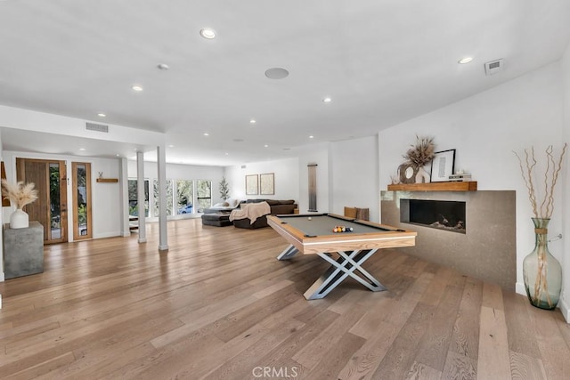 game room featuring billiards and light hardwood / wood-style floors