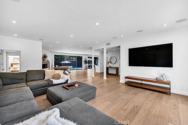 living room featuring light wood-type flooring