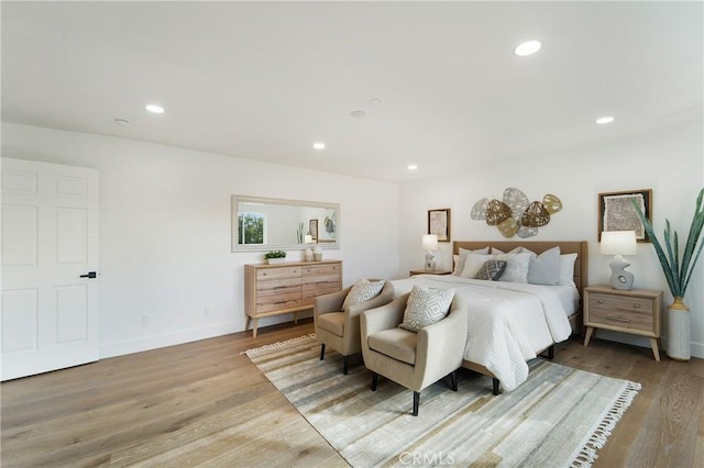 bedroom with light hardwood / wood-style flooring