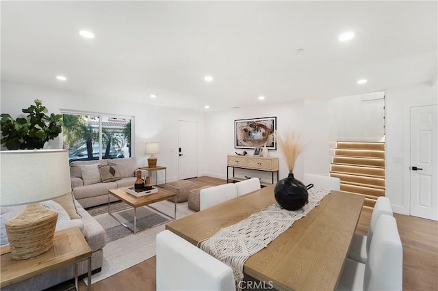 living room with light hardwood / wood-style flooring