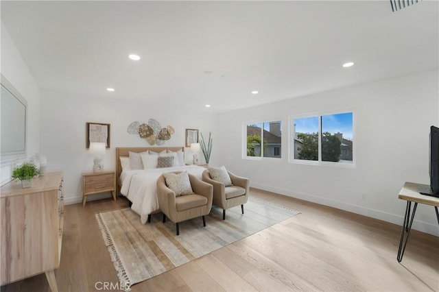 bedroom featuring light hardwood / wood-style flooring