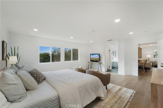 bedroom featuring light hardwood / wood-style flooring