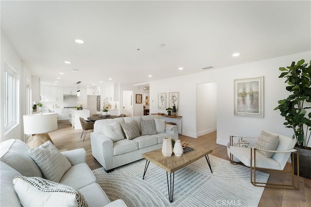 living room featuring light hardwood / wood-style floors