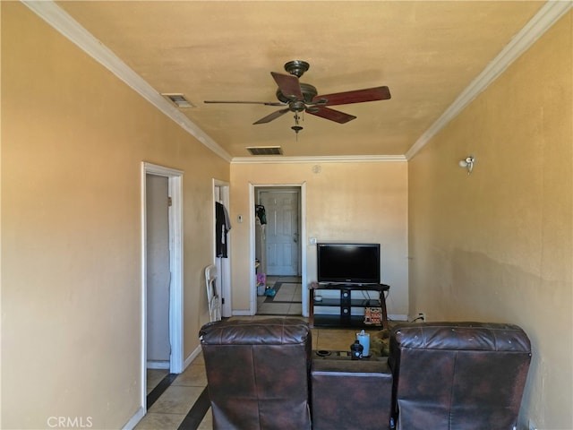 living room with light tile patterned flooring, ornamental molding, and ceiling fan
