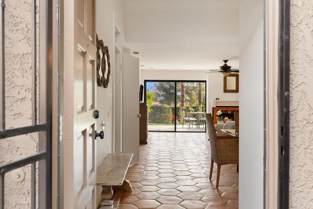 entryway with ceiling fan