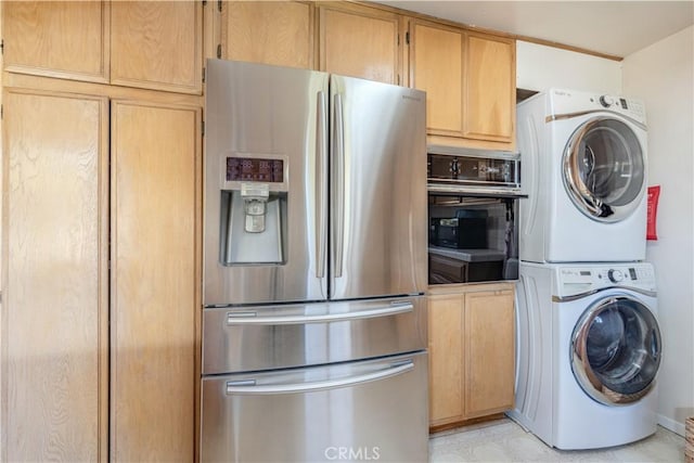 interior space featuring stacked washer and clothes dryer