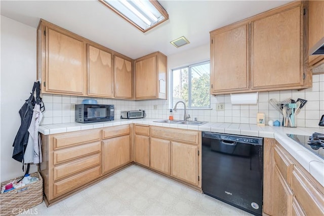 kitchen featuring sink, tile countertops, black appliances, and light brown cabinets