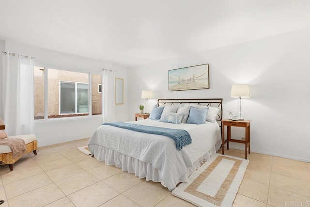 bedroom featuring light tile patterned floors