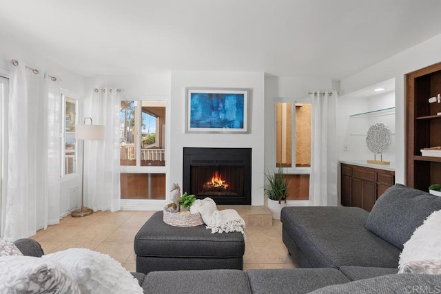 living room with light tile patterned flooring