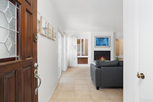 entrance foyer featuring light tile patterned floors