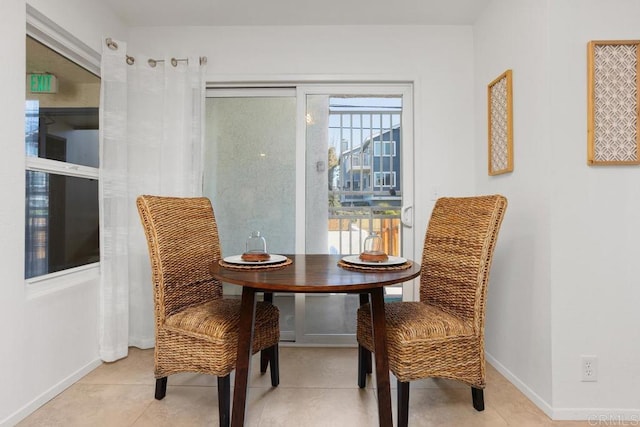 living area with light tile patterned floors