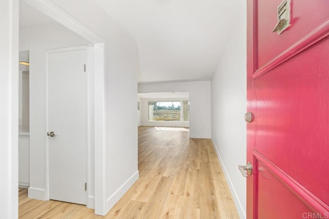 corridor featuring light hardwood / wood-style flooring