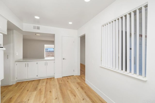 26405 Cherry Hills Blvd, Menifee, CA 92586 - empty room with baseboards, light wood-style flooring, and recessed lighting