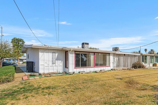 26405 Cherry Hills Blvd, Menifee, CA 92586 - rear view of property featuring a yard and board and batten siding