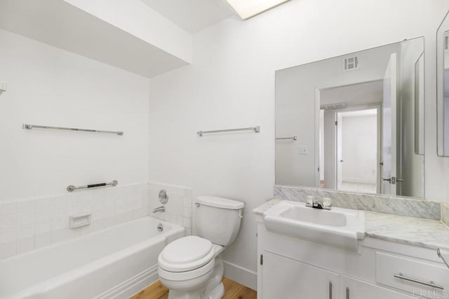 26405 Cherry Hills Blvd, Menifee, CA 92586 - full bathroom with vanity, toilet, a garden tub, wood finished floors, and baseboards