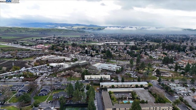 drone / aerial view featuring a mountain view