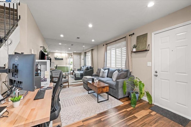 living room with hardwood / wood-style flooring