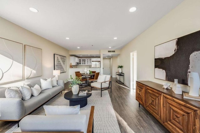 living room with dark wood-type flooring