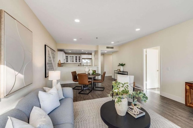 living room with hardwood / wood-style flooring