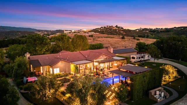 view of aerial view at dusk