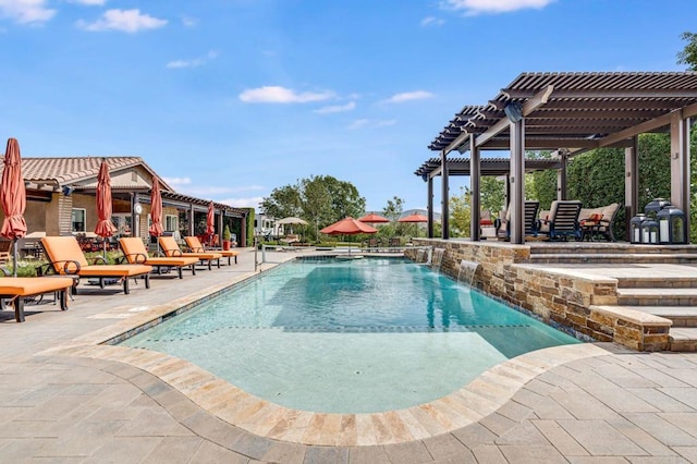 view of swimming pool featuring a pergola, a patio, and pool water feature