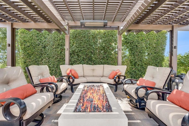 view of patio featuring an outdoor fire pit and a pergola