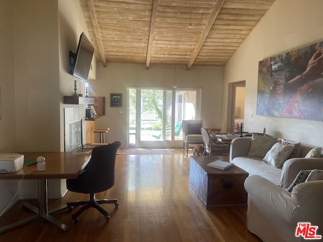 living room with hardwood / wood-style floors, lofted ceiling with beams, wooden ceiling, and a fireplace