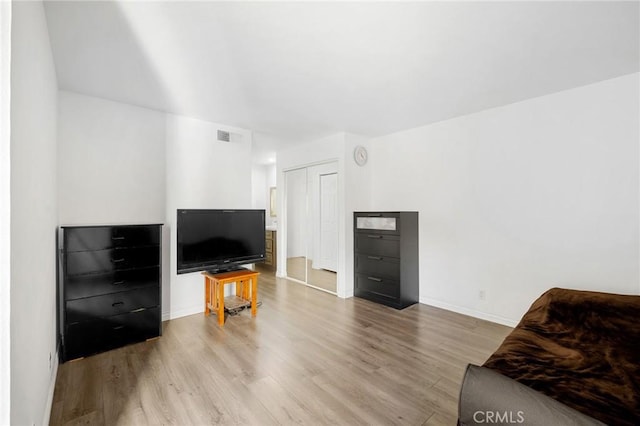 living room featuring light wood-type flooring