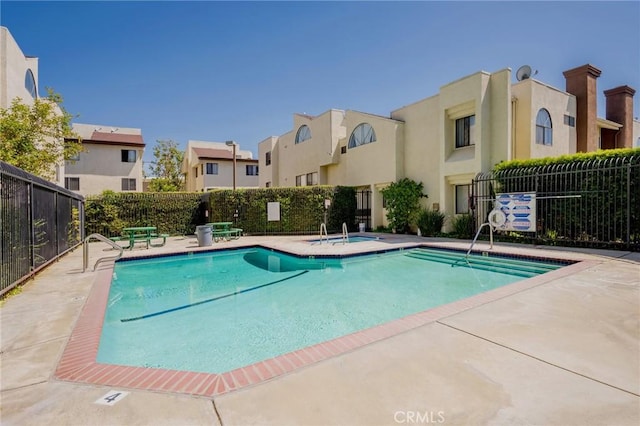 view of pool with a patio area