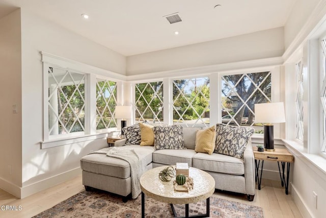 sunroom / solarium featuring a healthy amount of sunlight